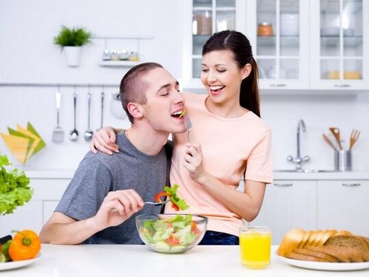 A woman feeding a man with a product naturally increases its effectiveness